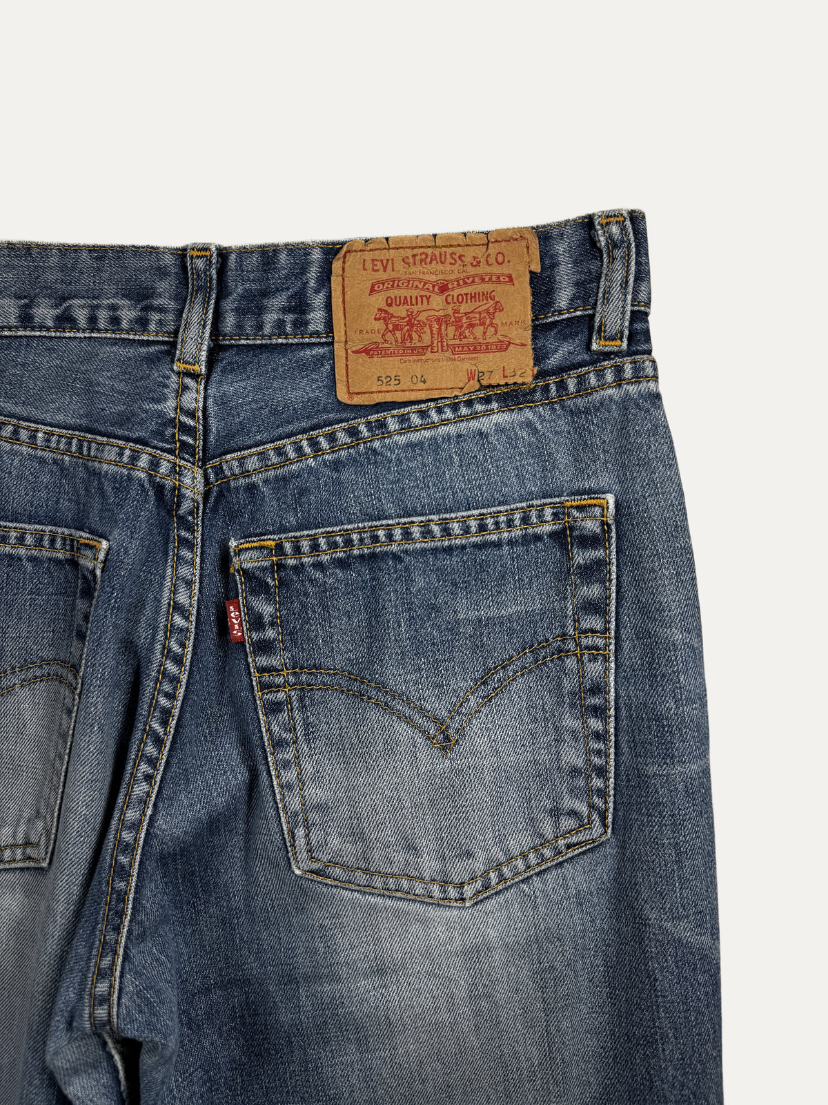 Vintage Levi's 525 Bootcut Jeans in mid wash, unisex, size W27 L32 – second-hand
