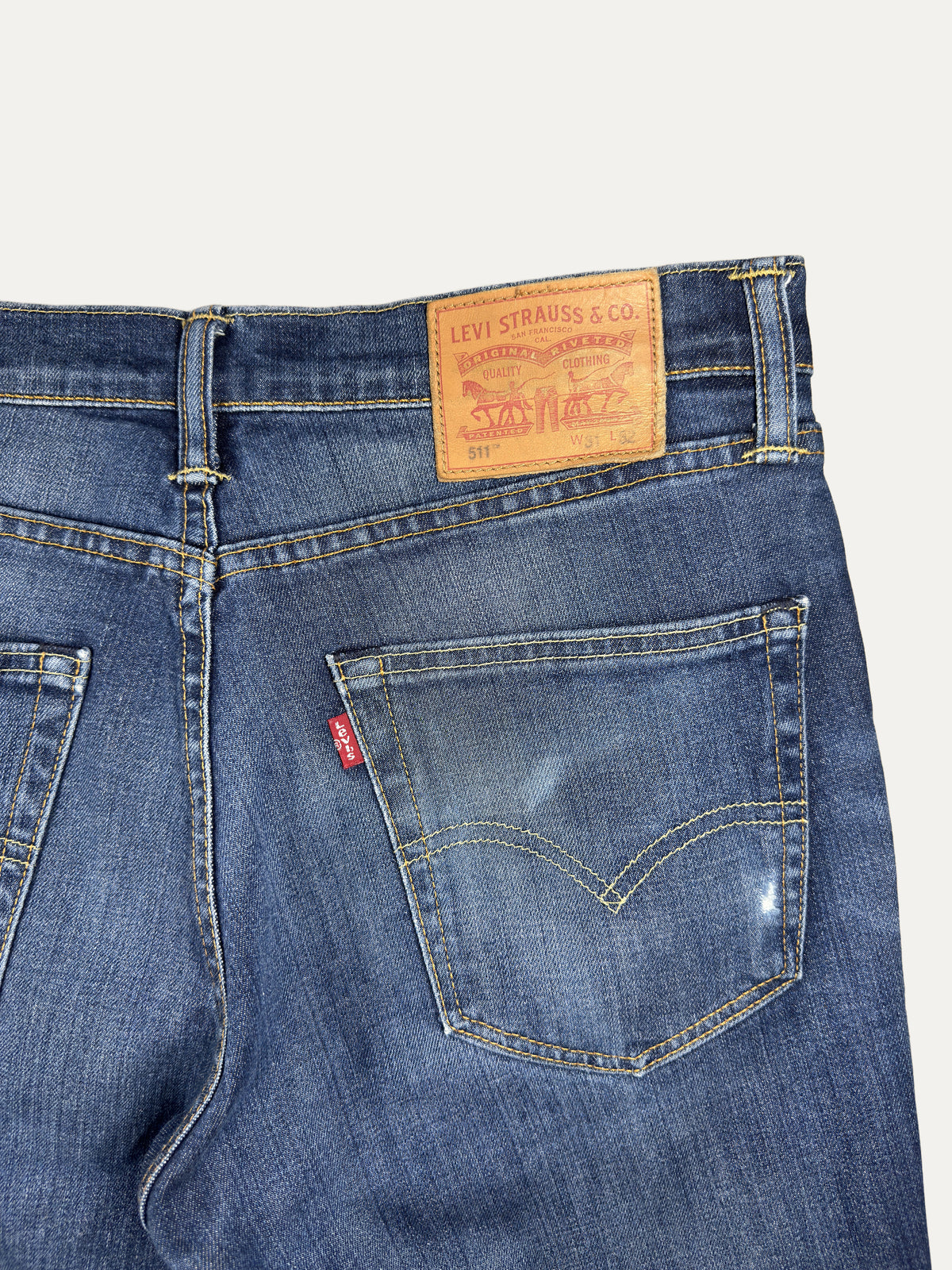 Vintage Levi's 511 Slim Jeans in mid wash, men's, size W31 L32 – second-hand