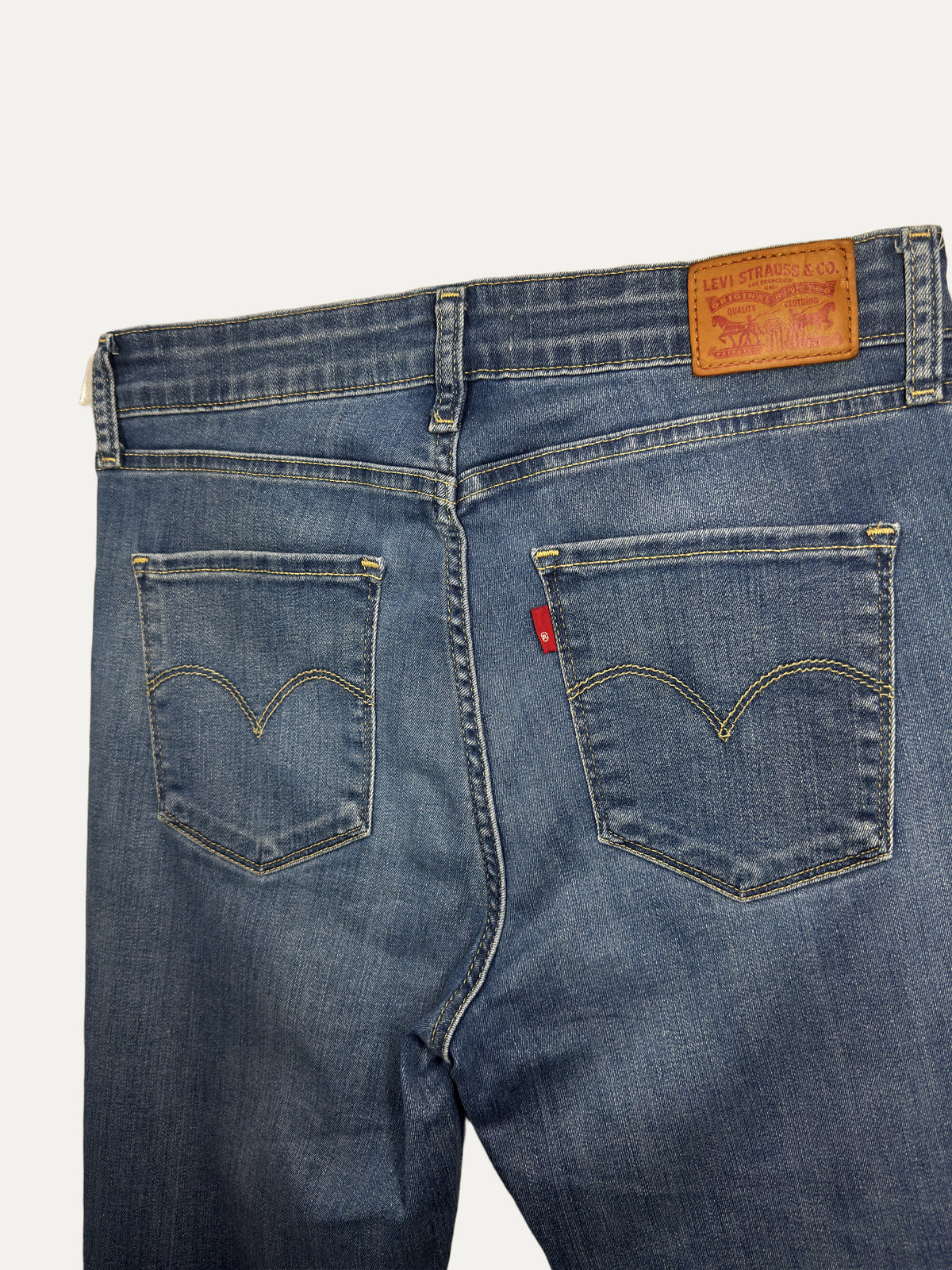 Vintage Levi's 721 Skinny Jeans in mid wash, unisex, size W31 – second-hand