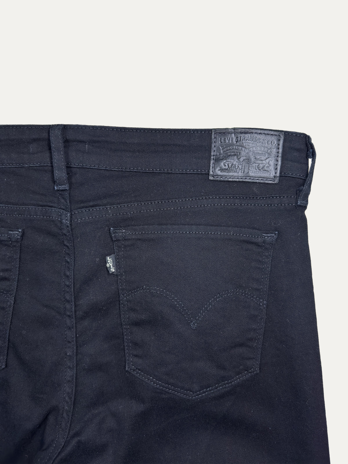 Vintage Levi's 712 Slim Jeans in black, women's, size W31 – second-hand