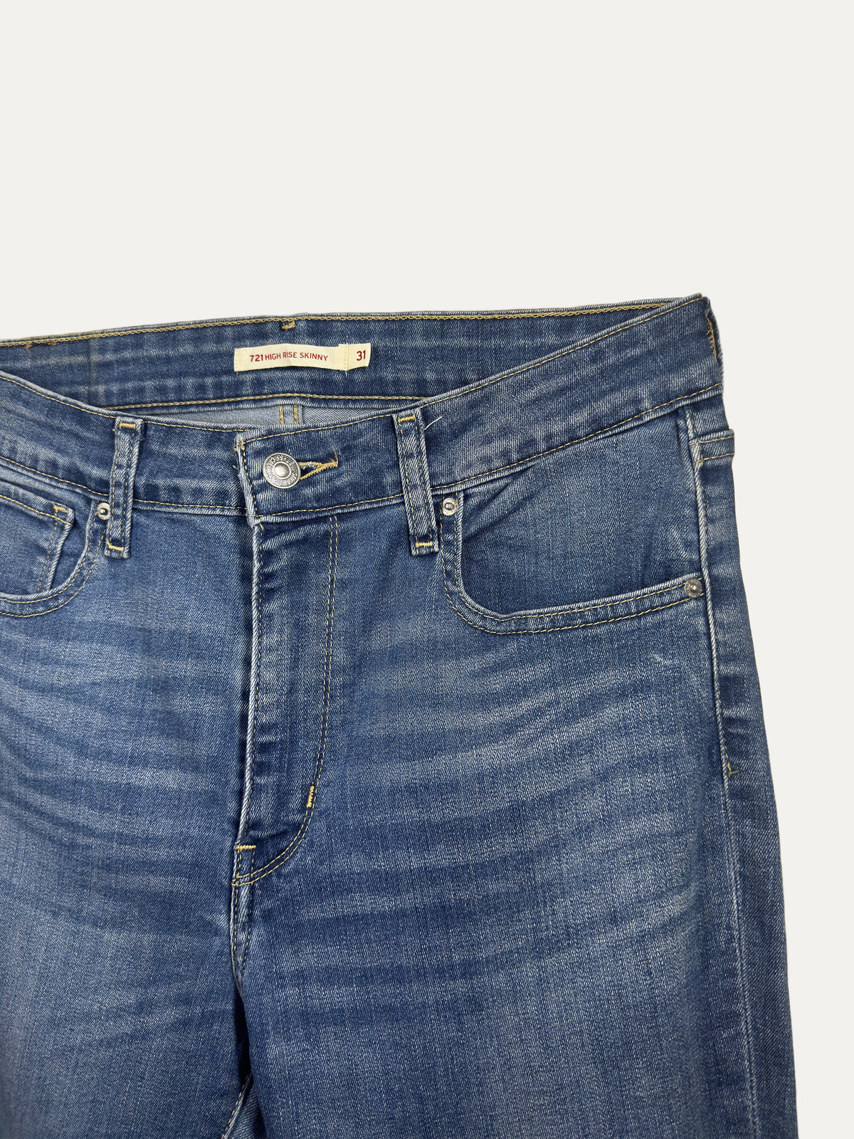 Vintage Levi's 721 Skinny Jeans in mid wash, unisex, size W31 – second-hand