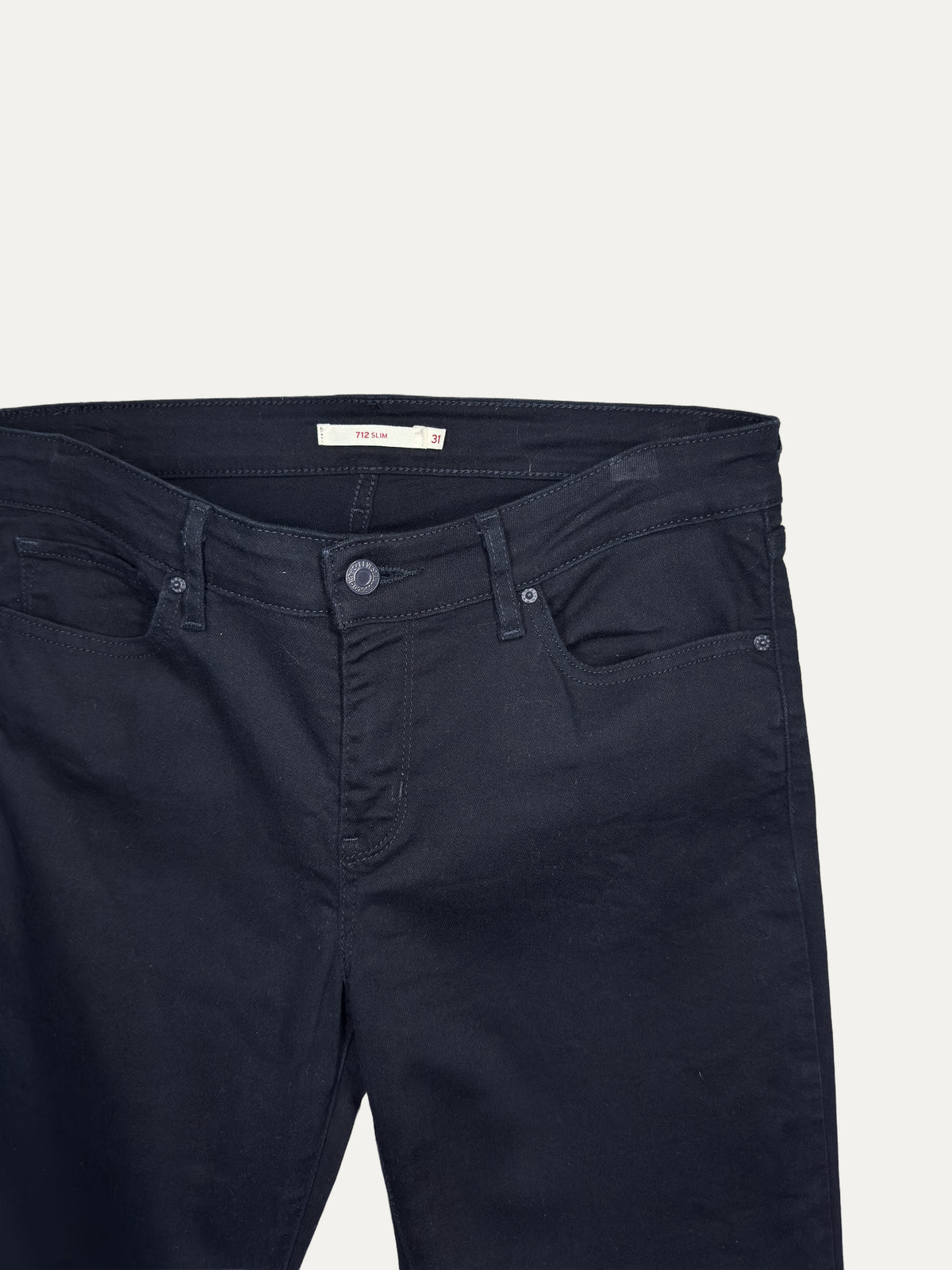 Vintage Levi's 712 Slim Jeans in black, women's, size W31 – second-hand