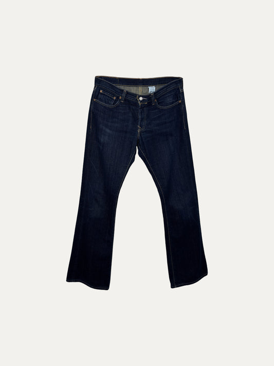 Vintage Levi's Bootcut Jeans in mid wash, unisex, size W35 L32 – second-hand