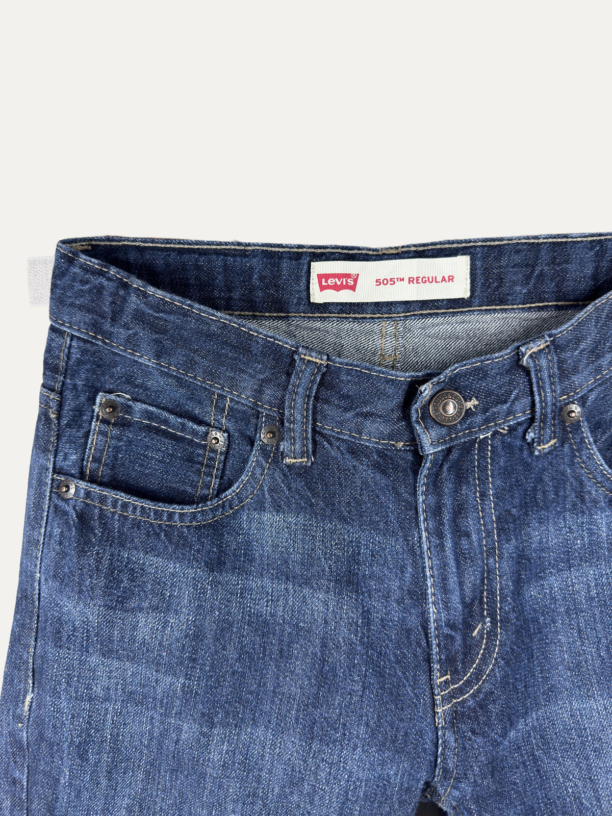 Vintage Levi's 505 Straight Jeans in dark wash, unisex, size W25 – second-hand