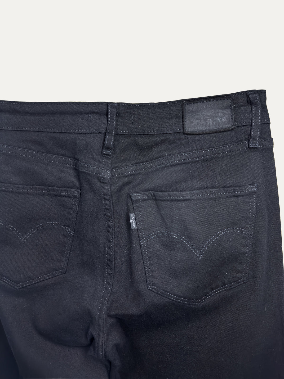 Vintage Levi's 721 Skinny Jeans in black, women's, size W28 – second-hand