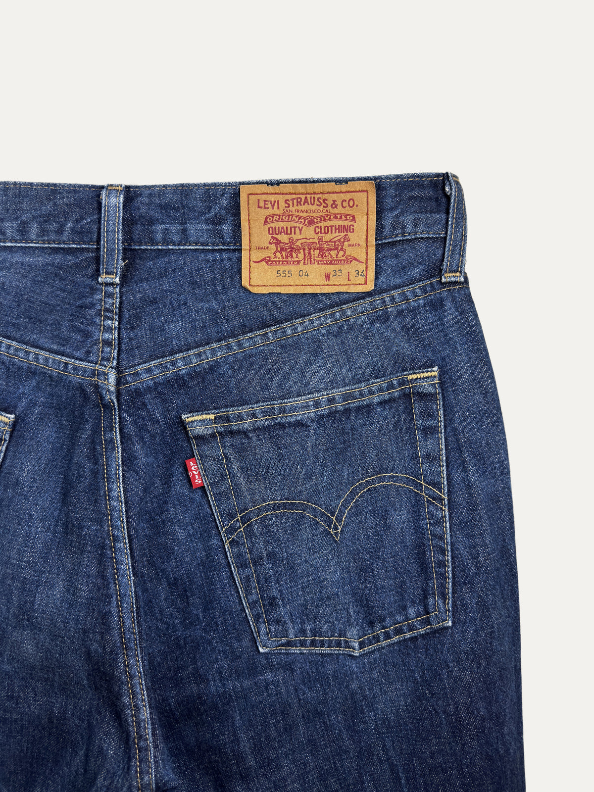 Vintage Levi's 555 Straight Jeans in mid wash, men's, size W33 L34 – second-hand