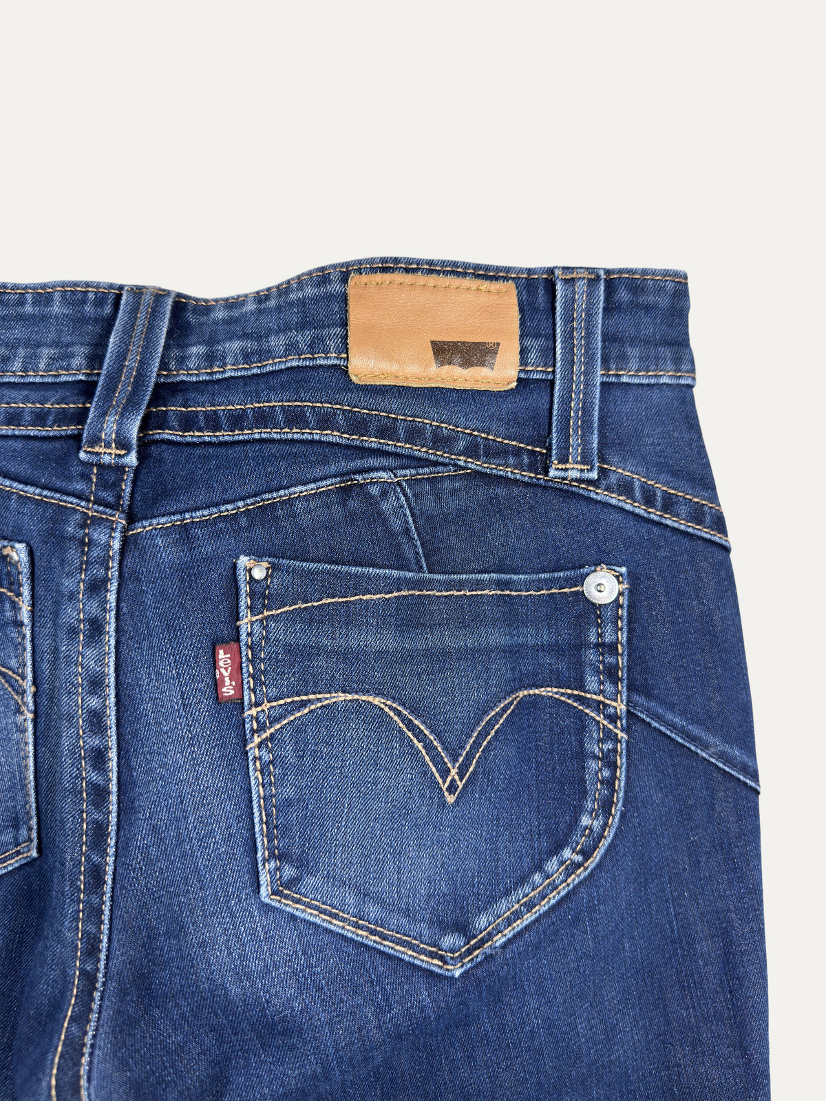 Vintage Levi's Demi Curve Low waist Jeans in mid wash, women's, size W27 – second-hand