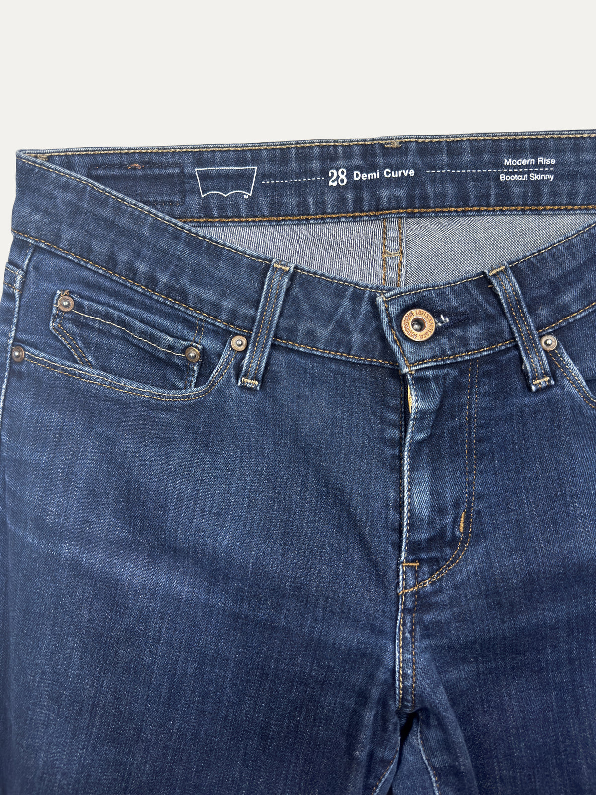 Vintage Levi's Demi Curve Bootcut Jeans in dark wash, women's, size W28 – second-hand