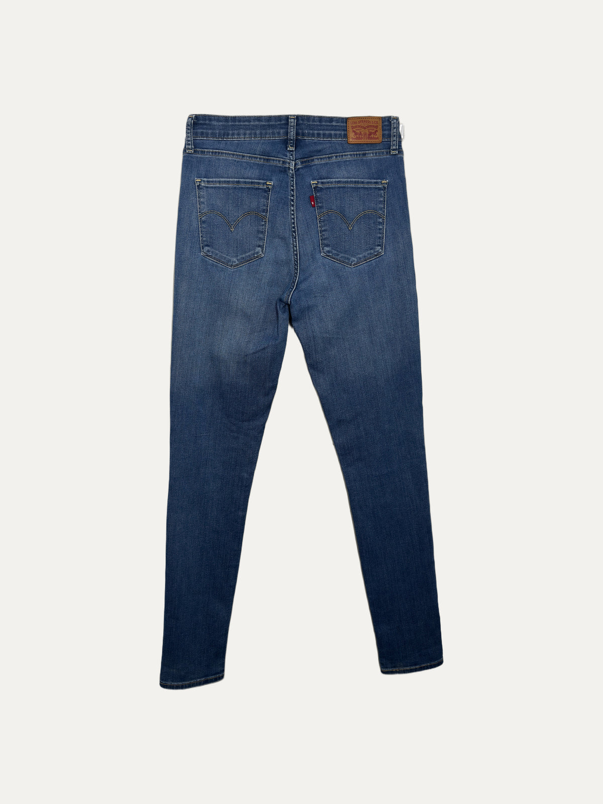 Vintage Levi's 721 Skinny Jeans in mid wash, unisex, size W31 – second-hand