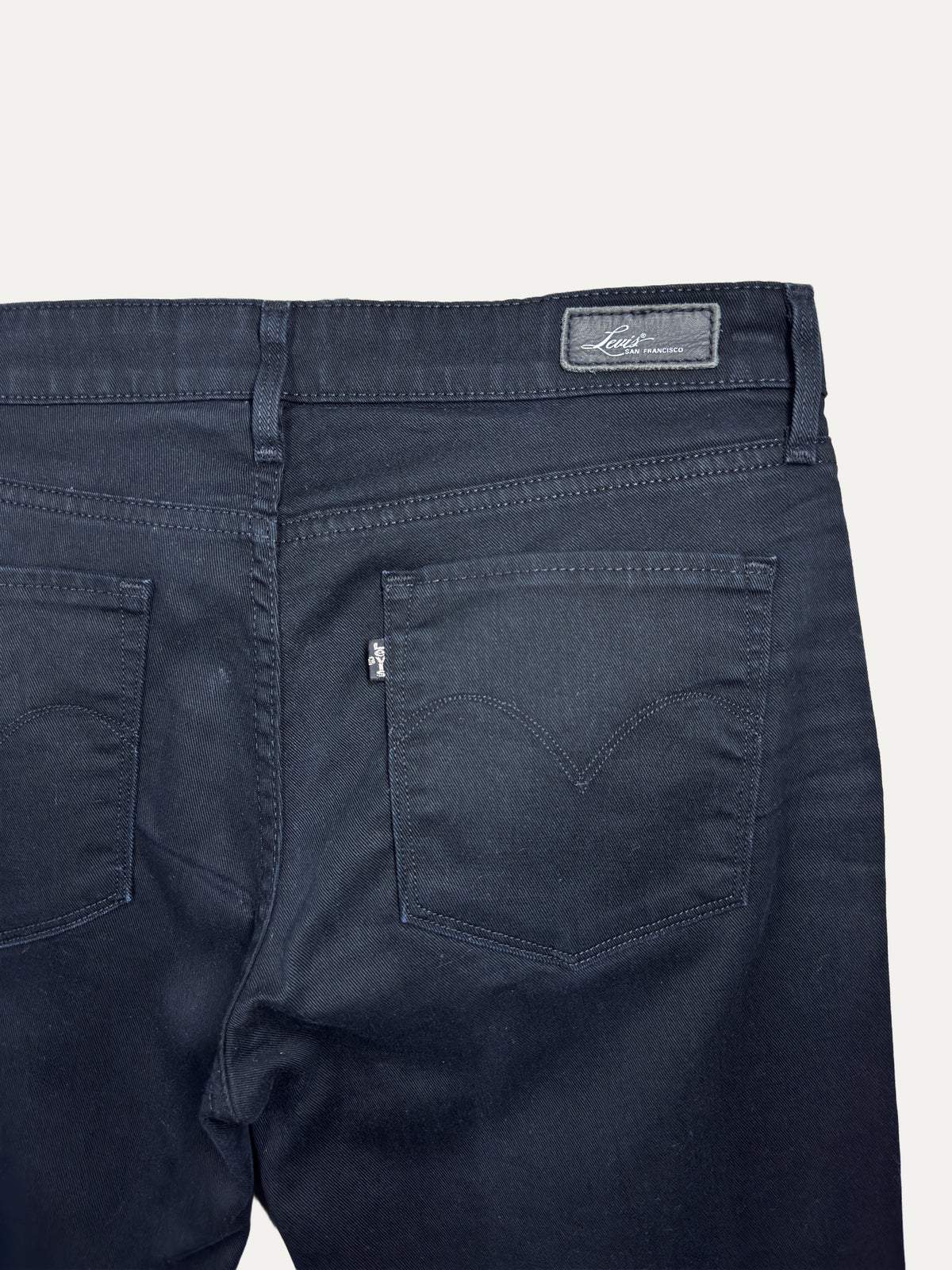 Vintage Levi's Demi Curve Straight Jeans in dark wash, women's, size W30 – second-hand