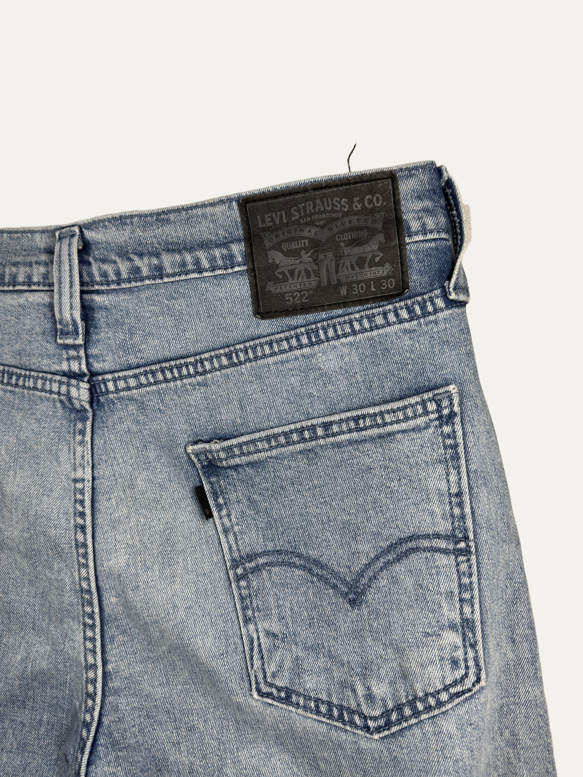 Vintage Levi's 522 Slim Jeans in light wash, unisex, size W30 L30 – second-hand