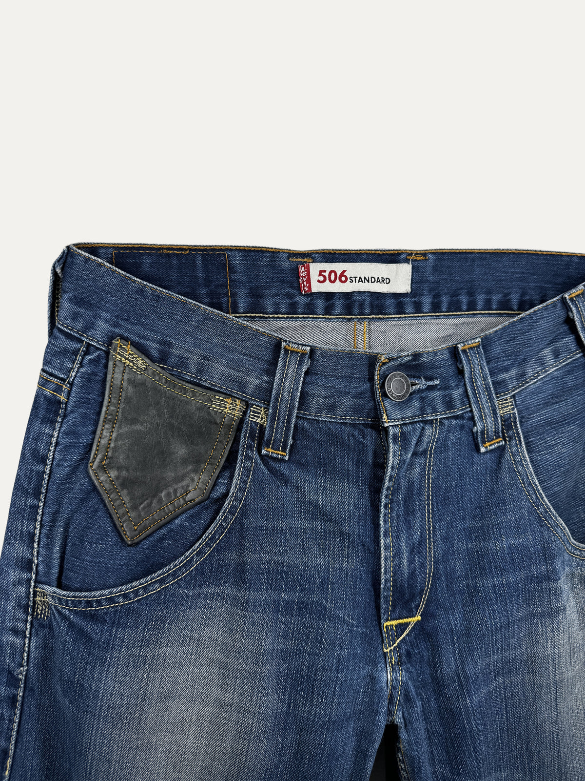 Vintage Levi's 506 Bootcut Jeans in mid wash, unisex, size W30 L34 – second-hand