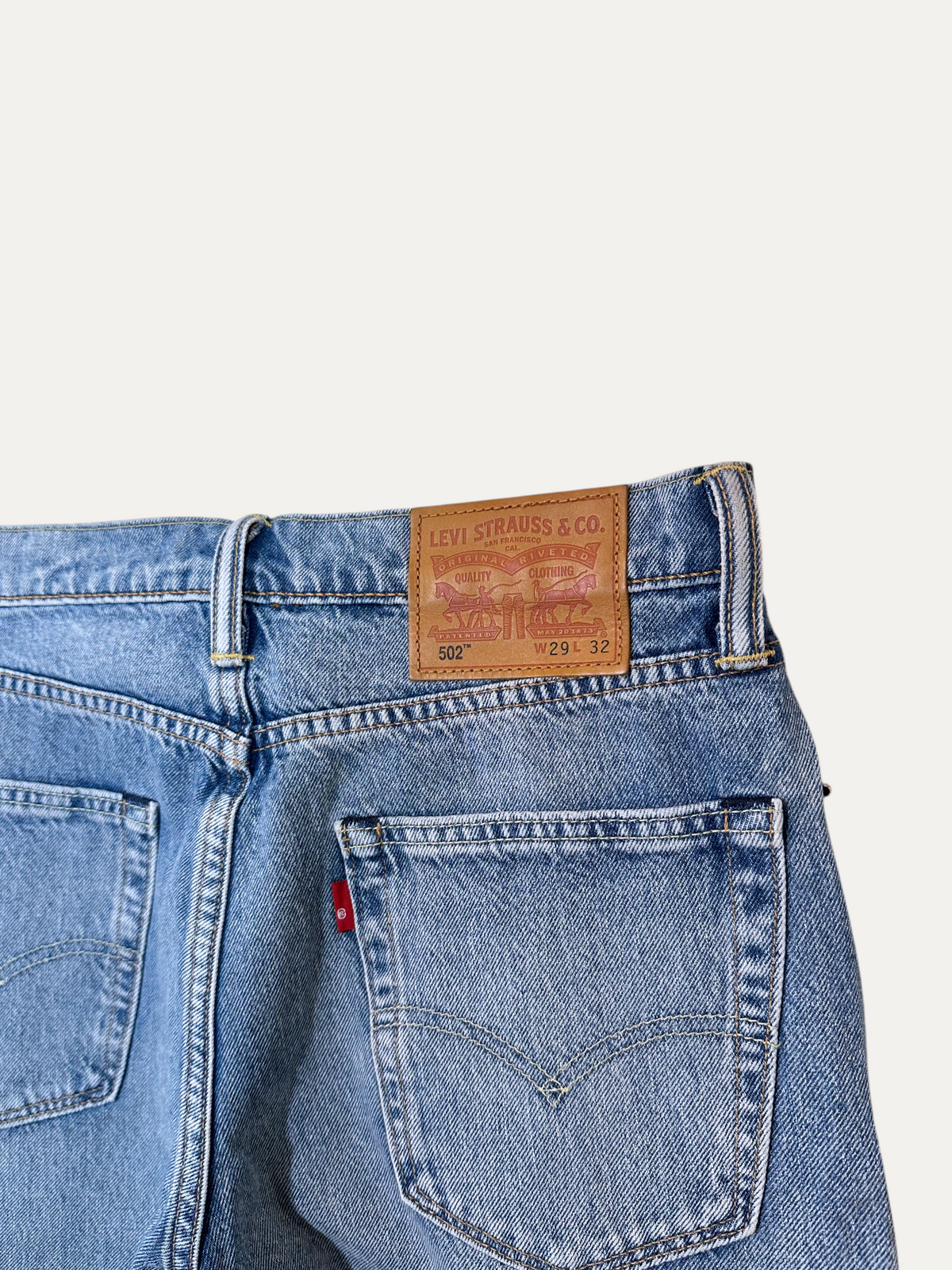Vintage Levi's 502 Straight Jeans in blue, unisex, size W29 L32 – second-hand