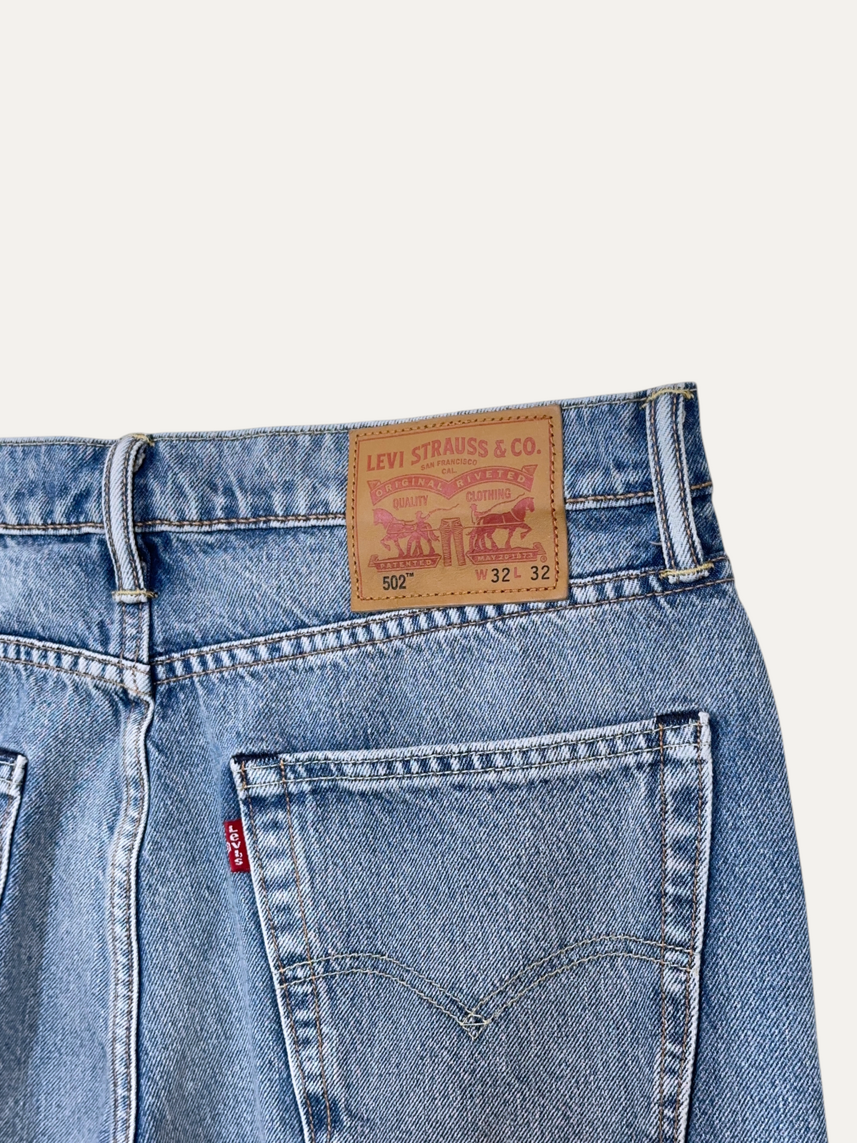Vintage Levi's 502 Straight Jeans in blue, unisex, size W32 L32 – second-hand